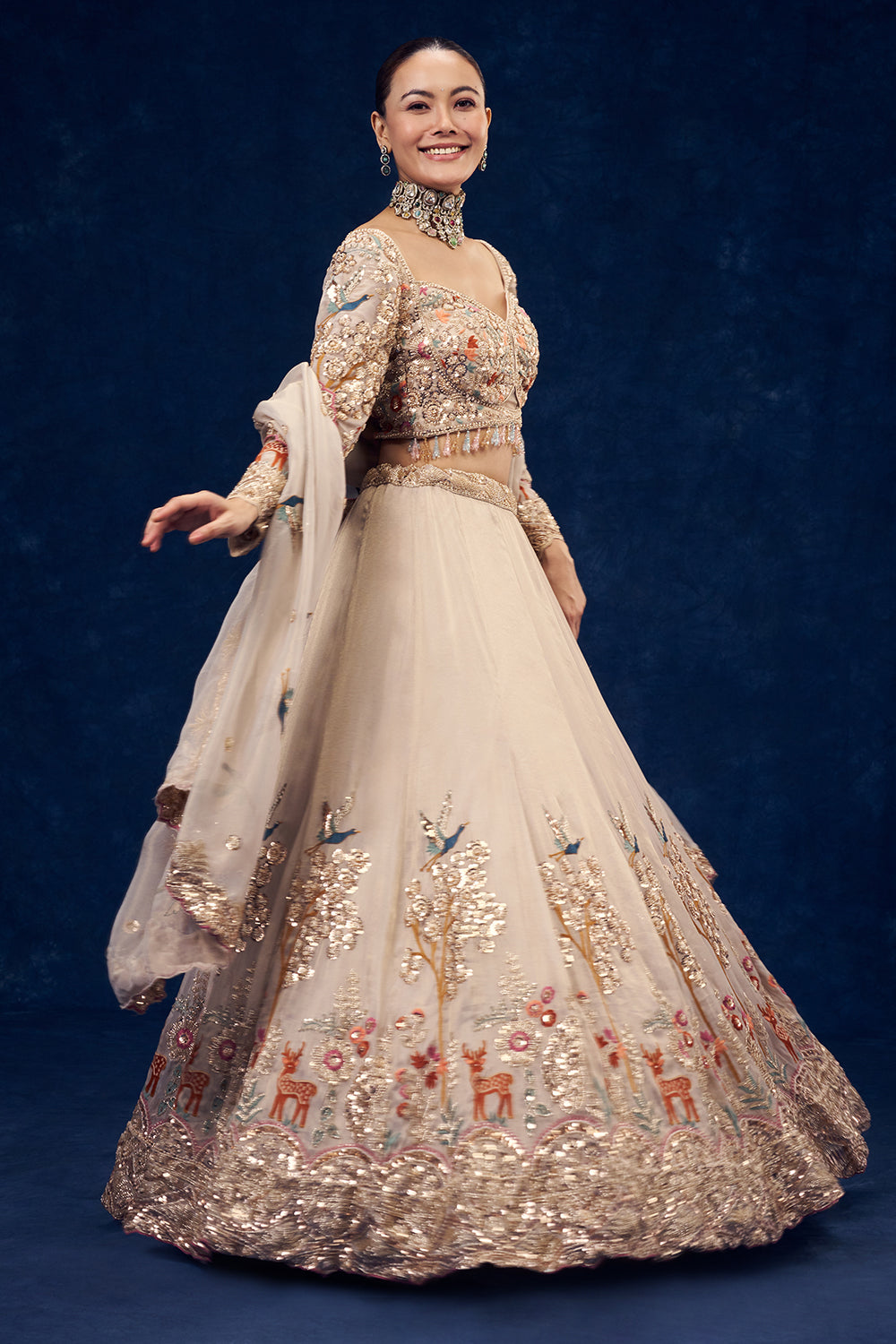 Beige Organza Lehenga with Forest Inspired Motifs and Resham Embroidery