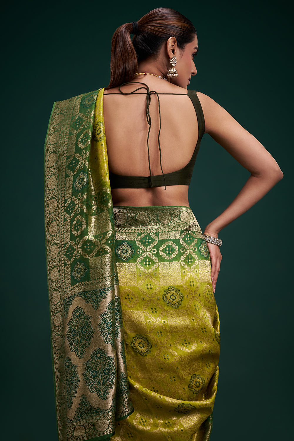 Green Banarasi Silk Saree with Banarasi-Inspired Motifs and Unstitched Blouse