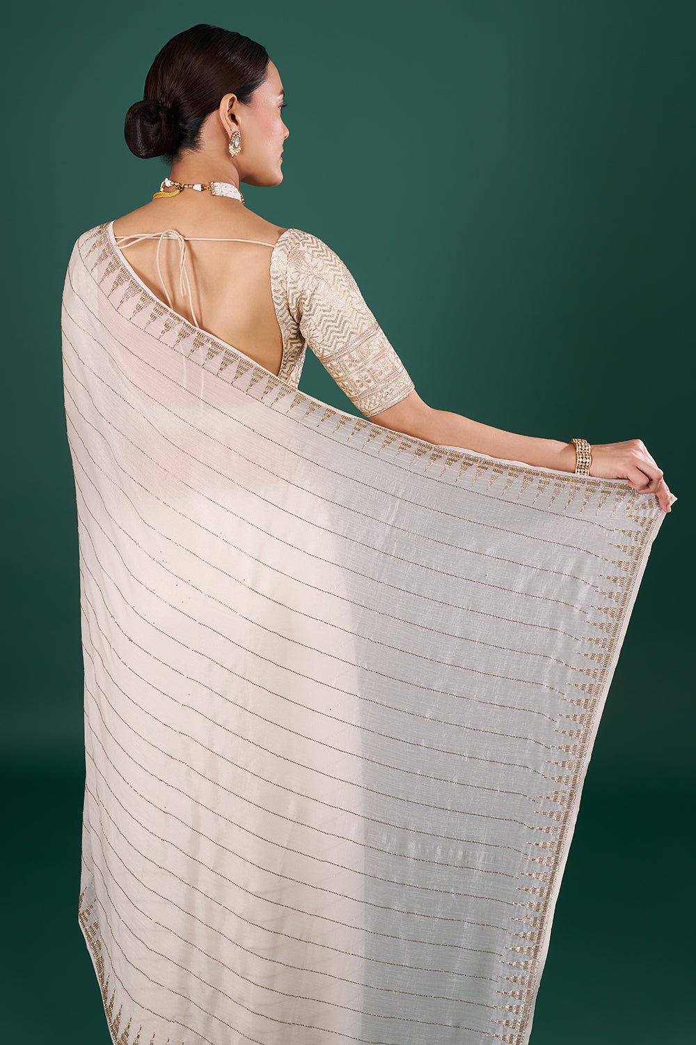 Ivory Georgette Saree with Cutdana Embroidery