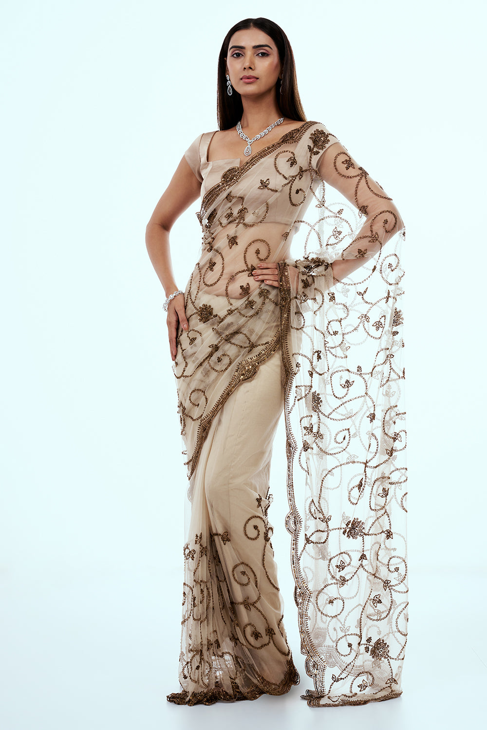 Ivory Net Saree with Bronze Cutdana Work