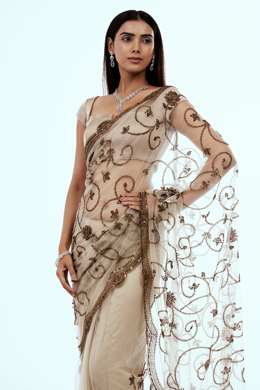 Ivory Net Saree with Bronze Cutdana Work