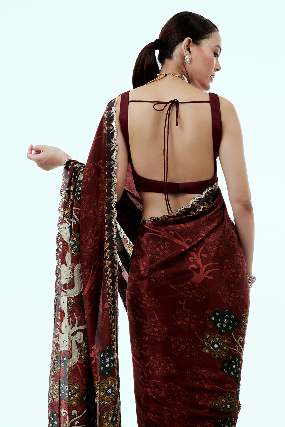 Maroon Printed Crepe Saree with Sequins and Zari Work