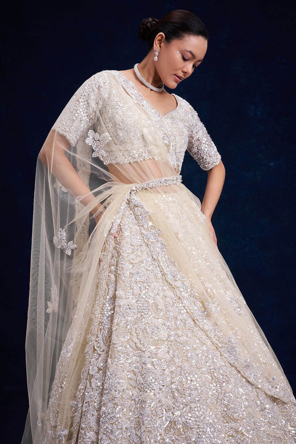 Off-White Net Bridal Lehenga with Cutdana Work