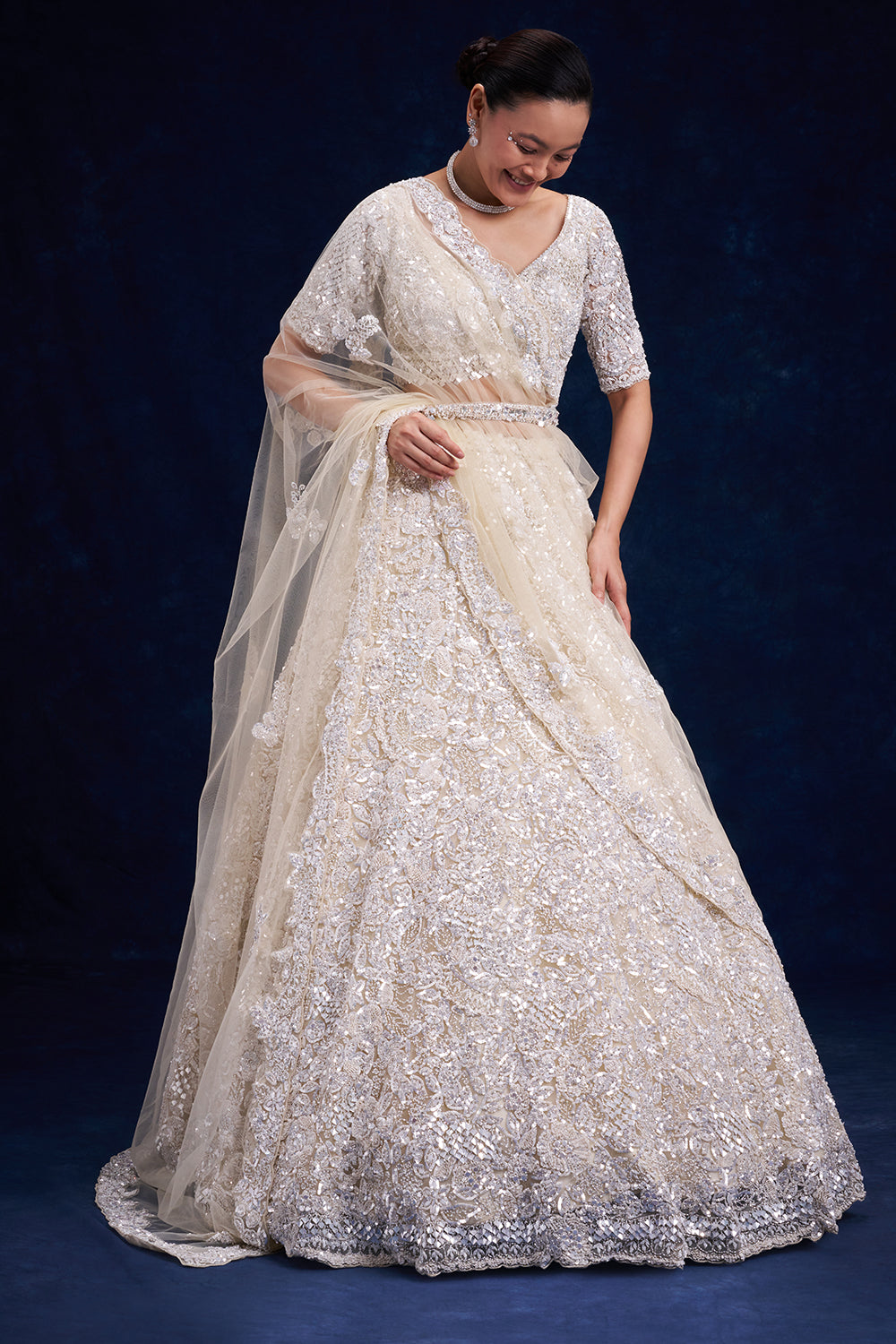 Off-White Net Bridal Lehenga with Cutdana Work