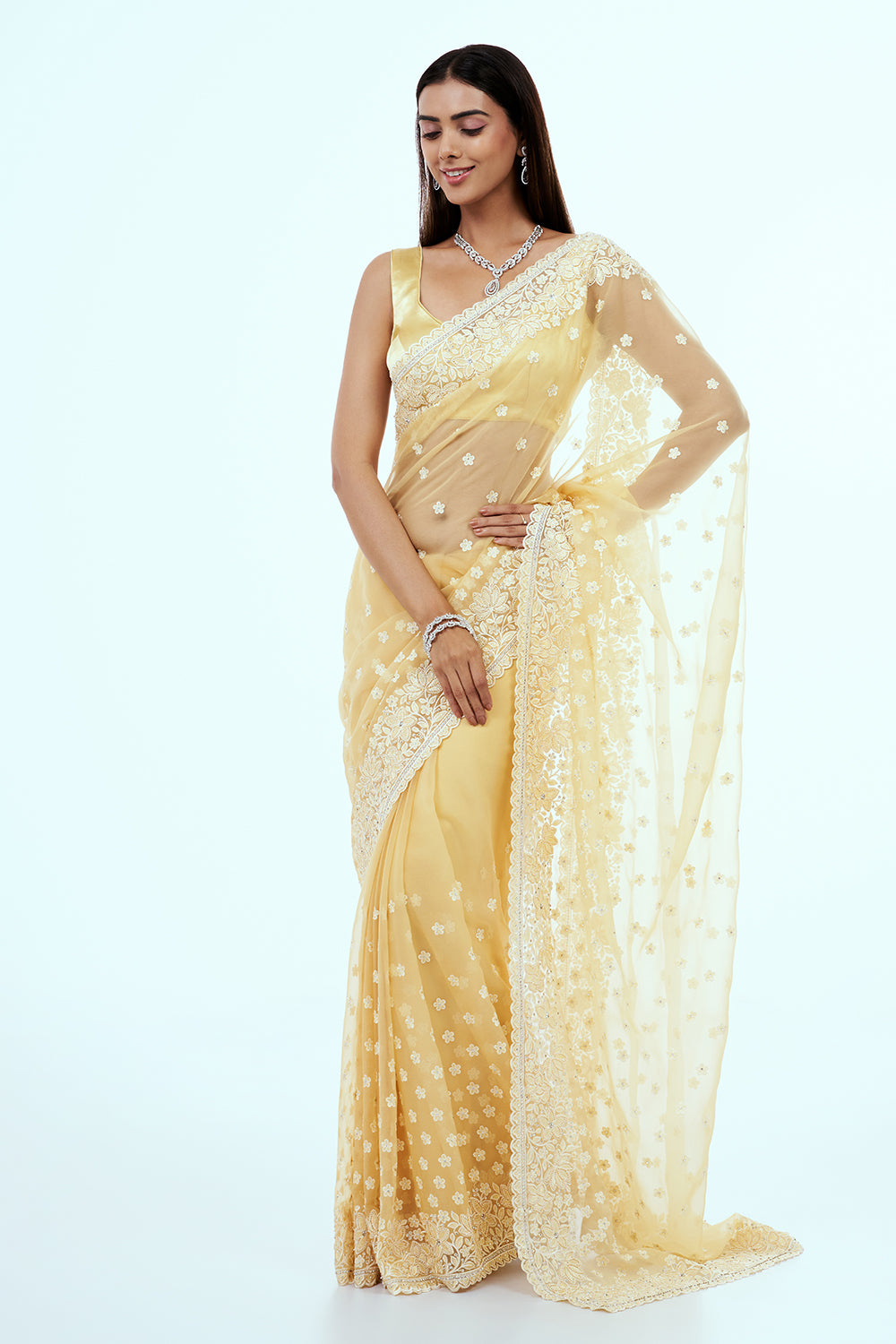 Pastel Yellow Organza Saree with Resham Embroidery and Butti Work