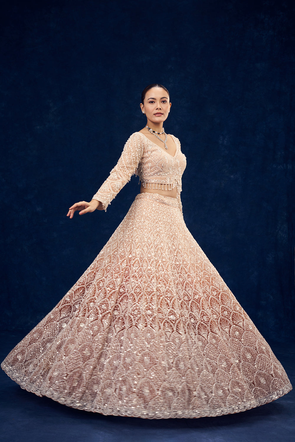 Peach and Orange Net Lehenga with Cutdana Hand Work