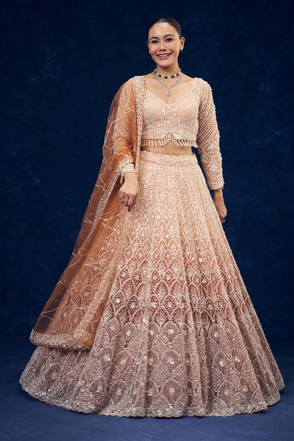 Peach and Orange Net Lehenga with Cutdana Hand Work