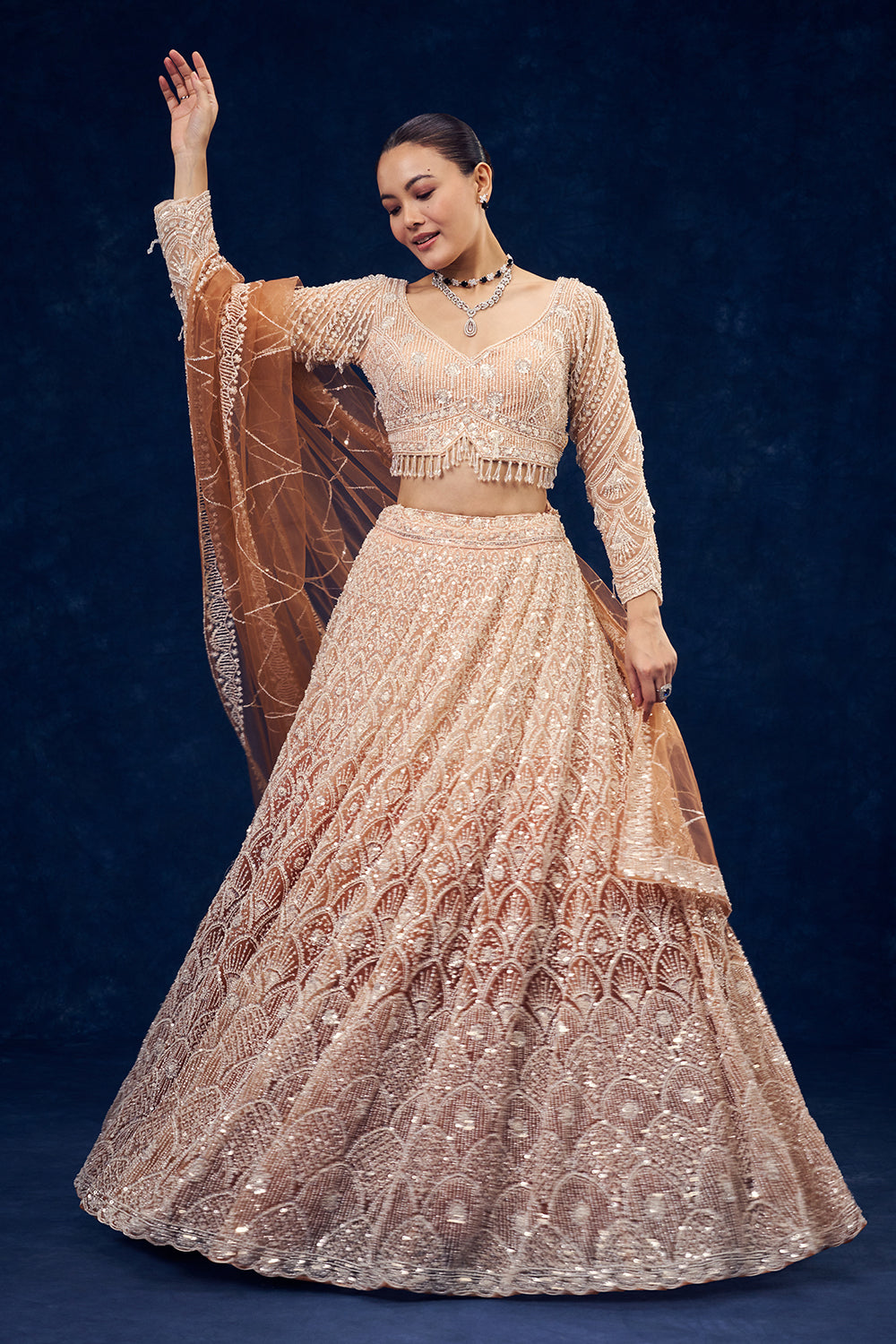 Peach and Orange Net Lehenga with Cutdana Hand Work