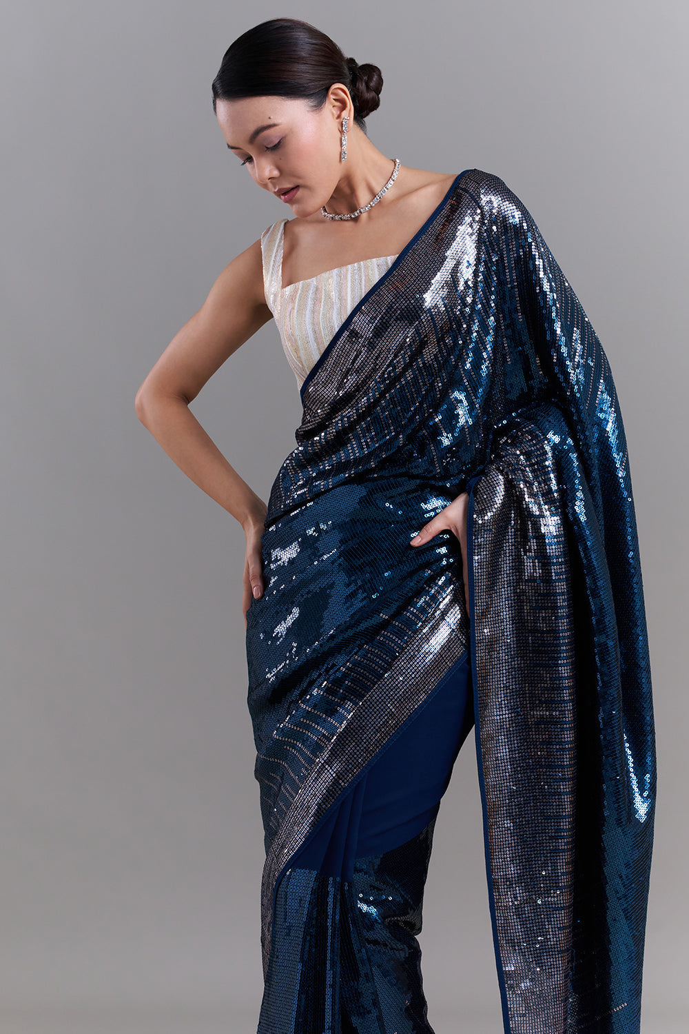 Peacock Blue Georgette Saree with Sequin Detailing