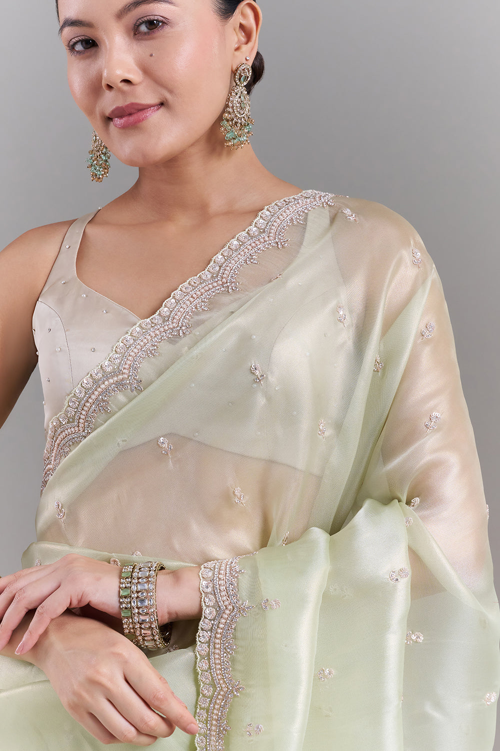 Pista Green Shimmer Tissue Embellished Saree