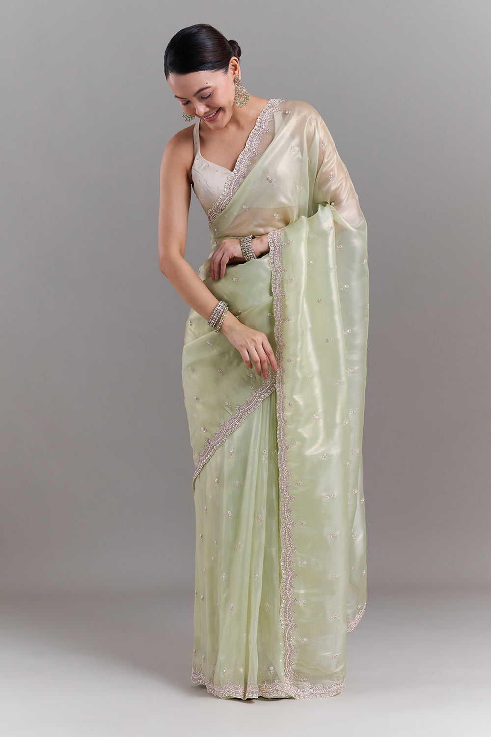 Pista Green Shimmer Tissue Embellished Saree