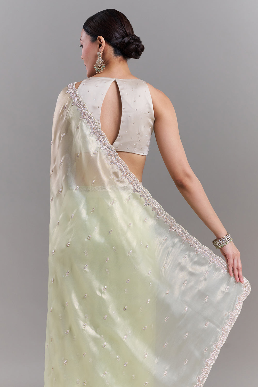 Pista Green Shimmer Tissue Embellished Saree