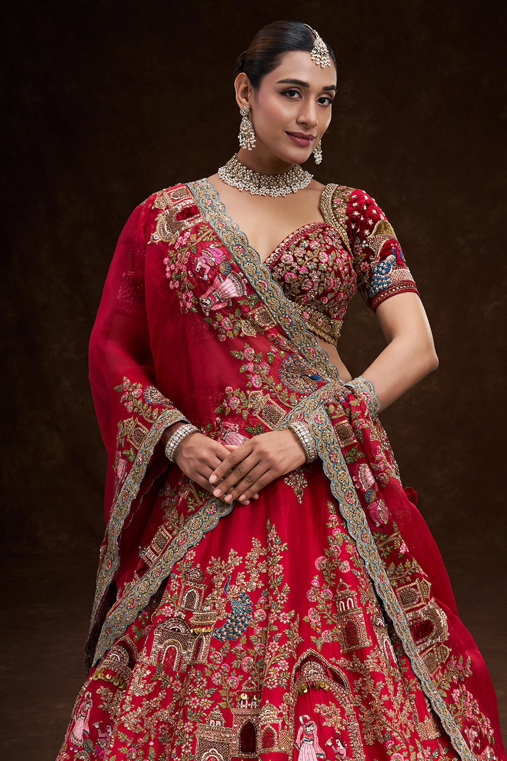 Red Raw Silk Bridal Lehenga with Royal Garden Zardozi Work and Velvet Blouse