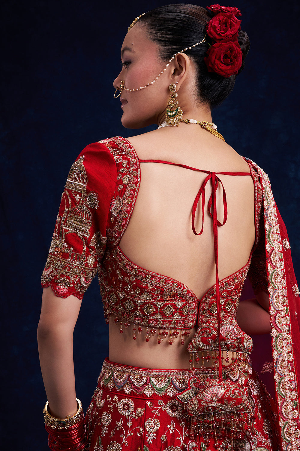 Red Raw Silk Bridal Lehenga with Sequins and Resham Work