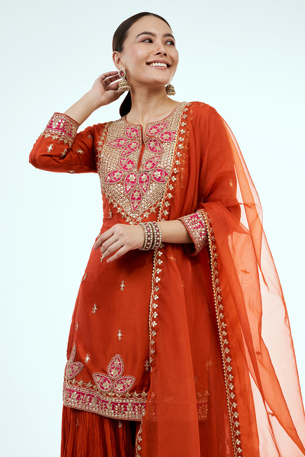 Rust Art Silk Palazzo Suit with Gota Work