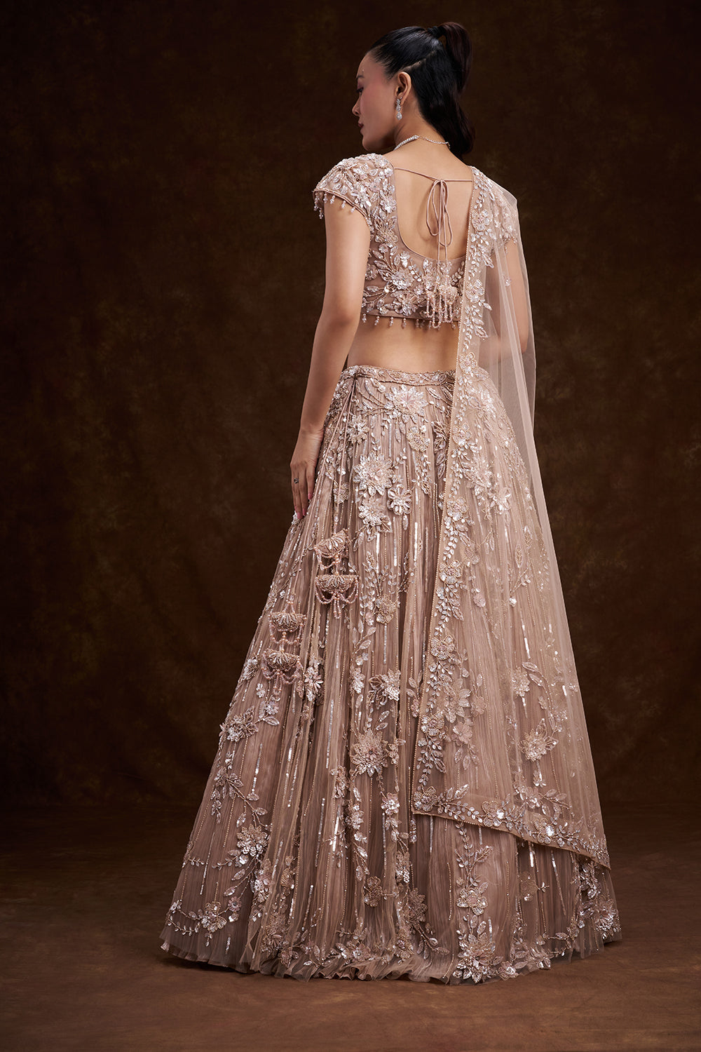 Sand Gold Net Bridal Lehenga with 3D Floral Embellishments