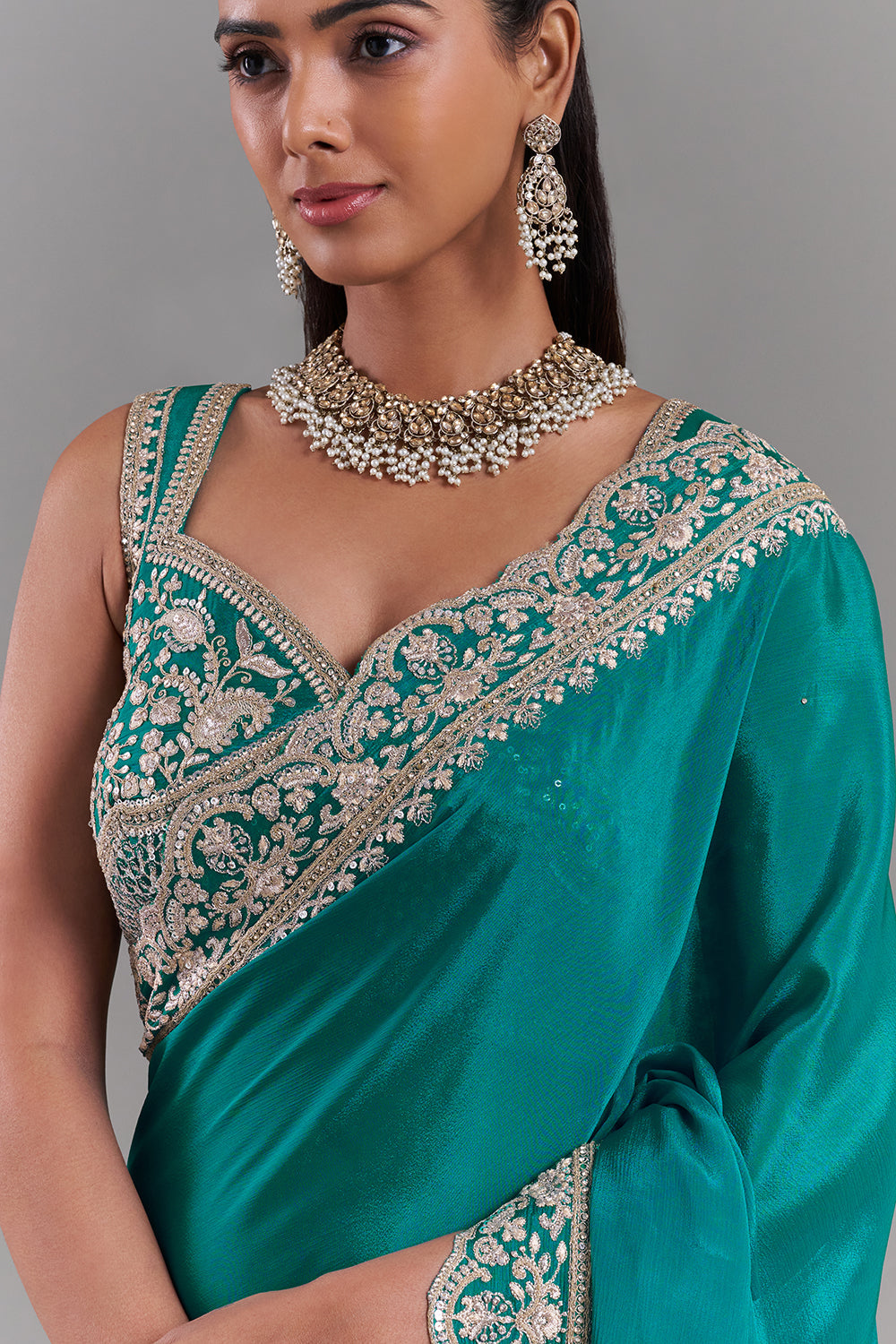 Teal Green Chiffon Saree with Stitched Blouse