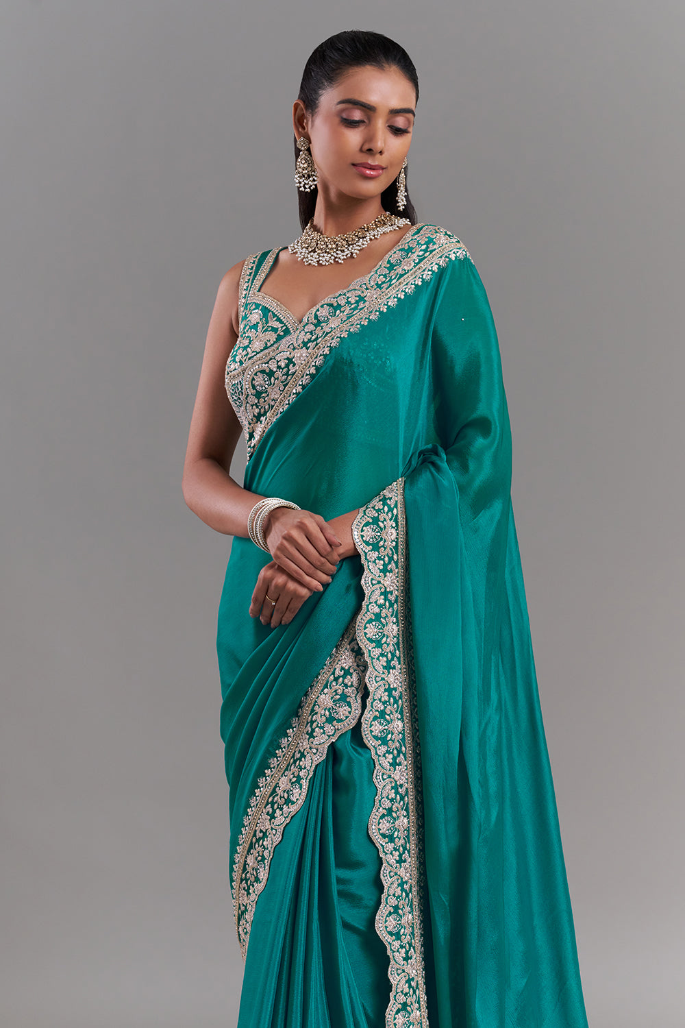 Teal Green Chiffon Saree with Stitched Blouse