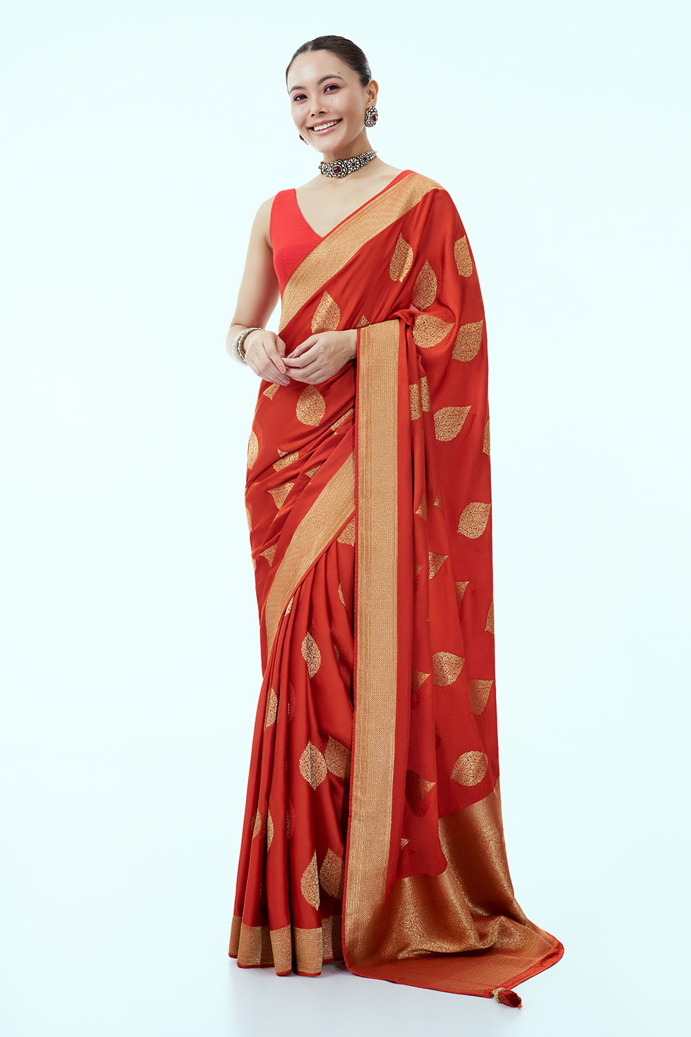 Vermillion Banarasi Brocade Saree with Leaf Imprint and Unstitched Blouse