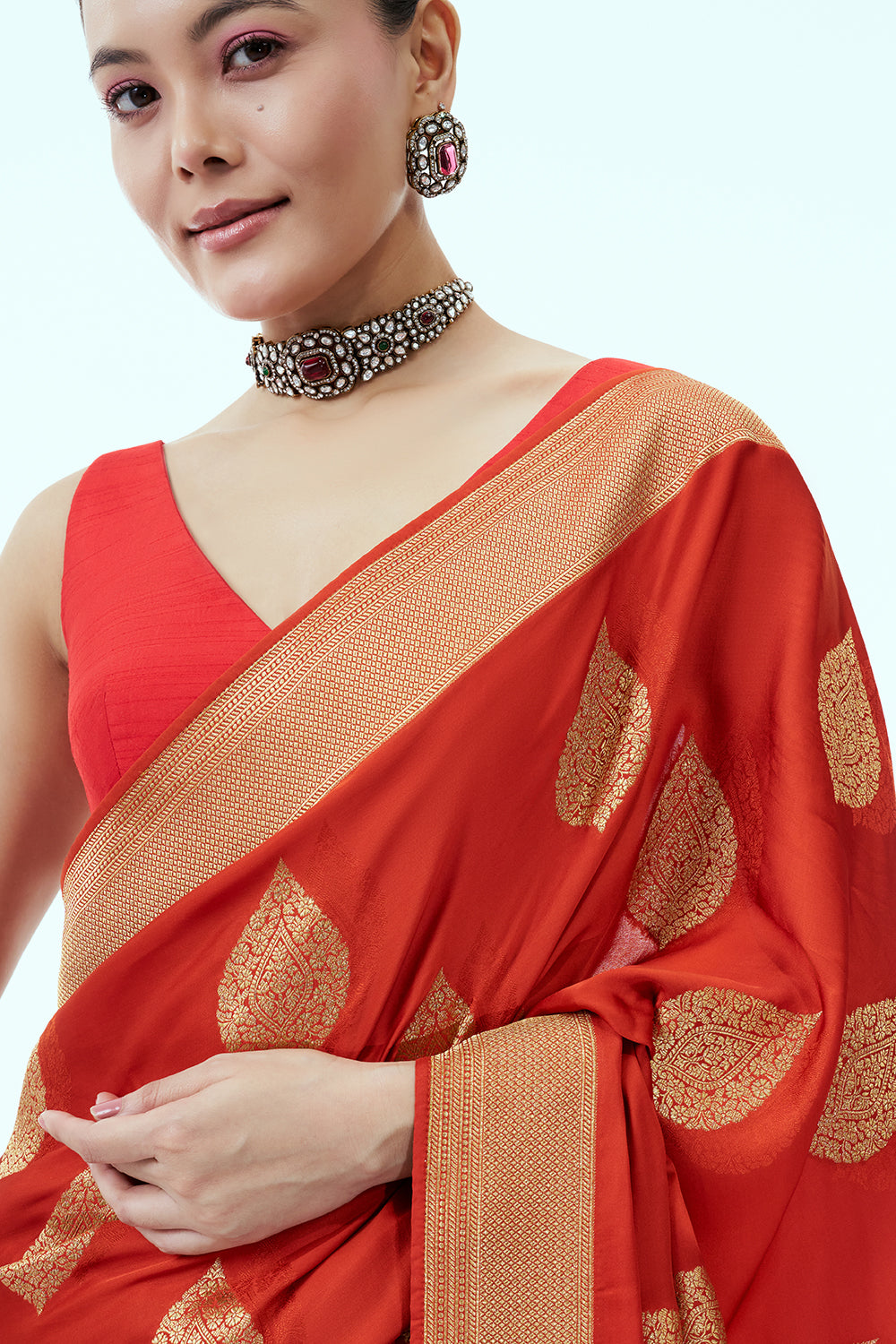 Vermillion Banarasi Brocade Saree with Leaf Imprint and Unstitched Blouse
