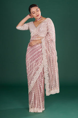 Onion Pink Net Saree with Scalloped Border and Stitched Blouse